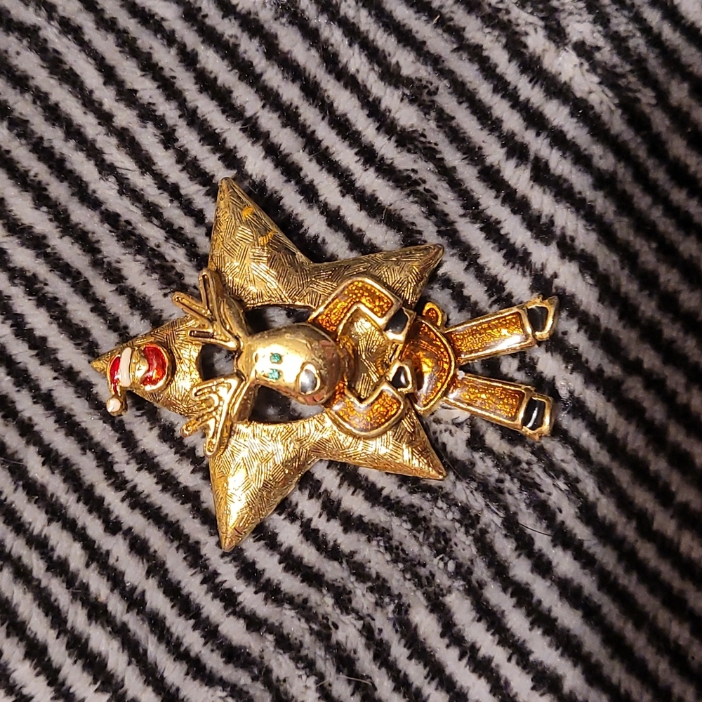 A vintage gold pin